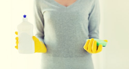 Professional cleaners maintaining a local Hammersmith office building
