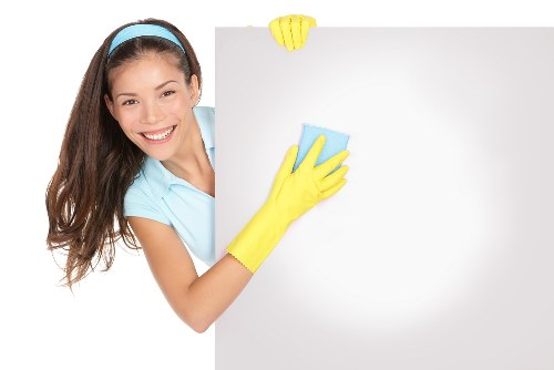 Local cleaner inspecting a mattress in Hammersmith before treatment